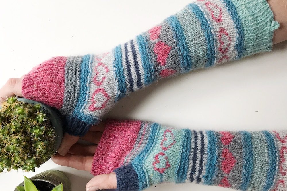 Knitted mitts with hearts